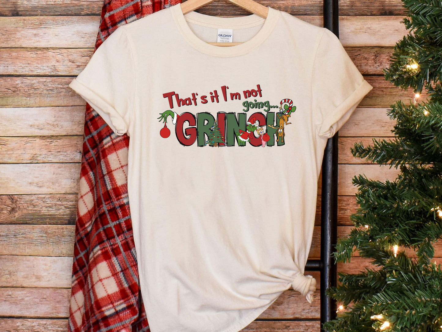a white t - shirt that says, that's it's not grin