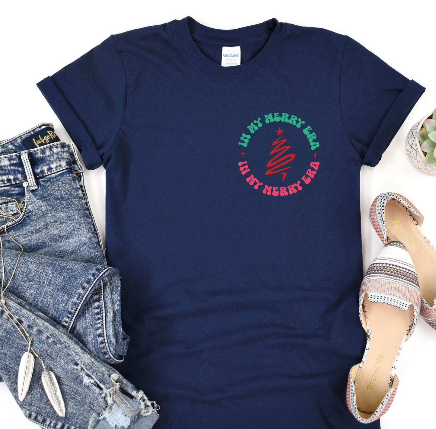 a women's t - shirt with a picture of a woman's hand
