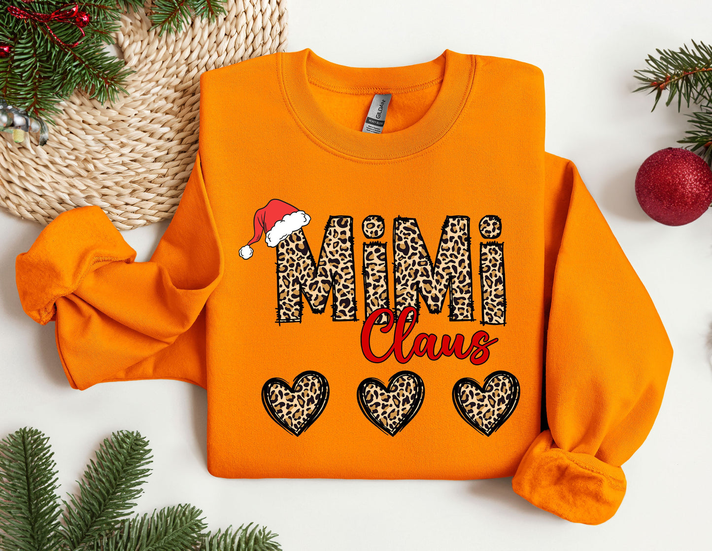 an orange sweatshirt with leopard print on it