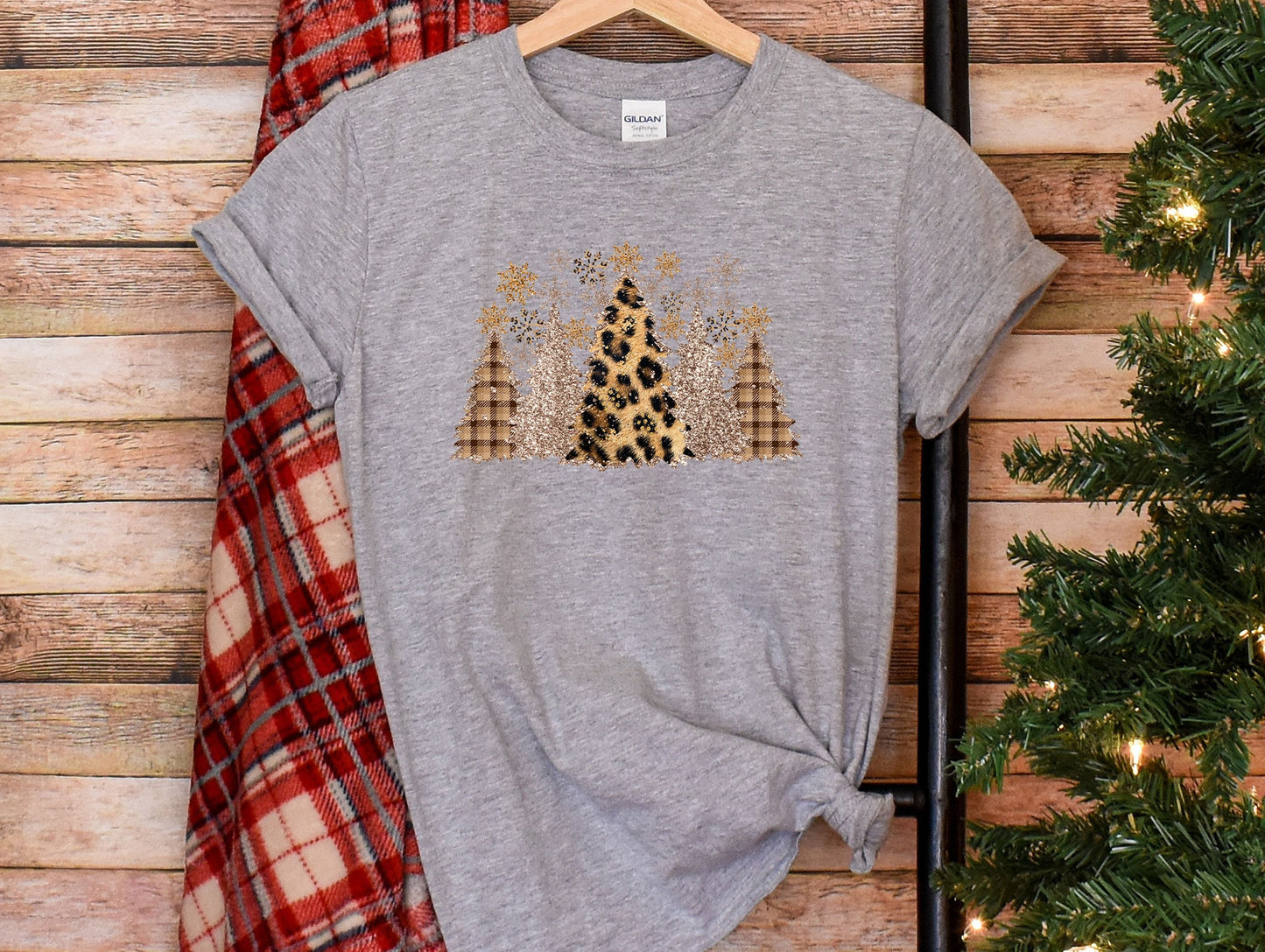 a gray shirt with a leopard print on it