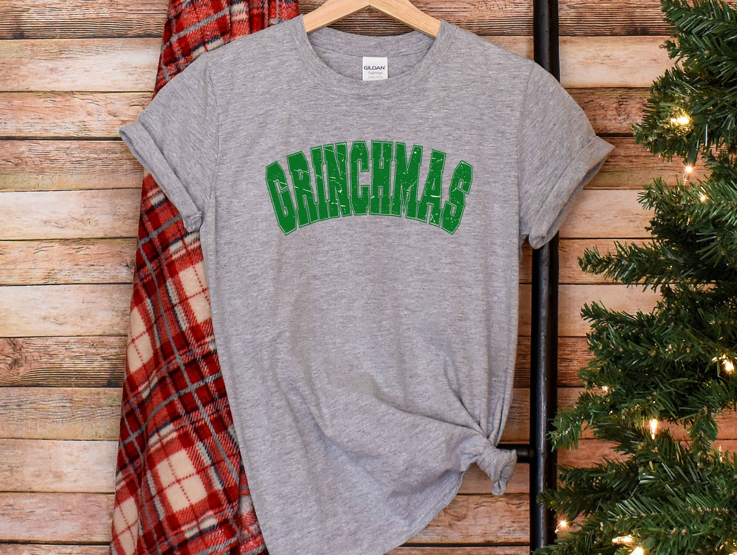 a t - shirt with the word grinna's on it next to a