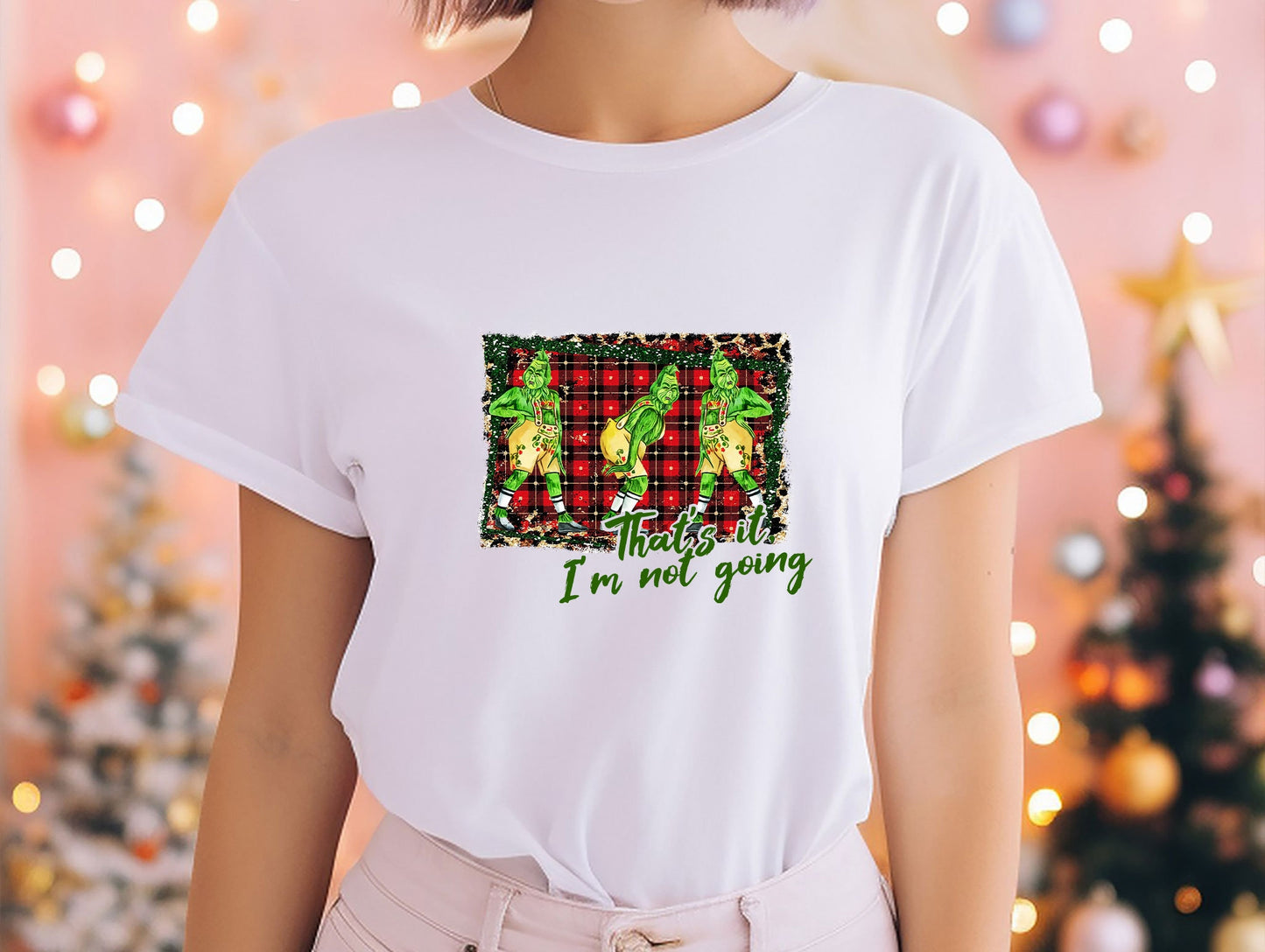 a woman wearing a white t - shirt that says i'm not going
