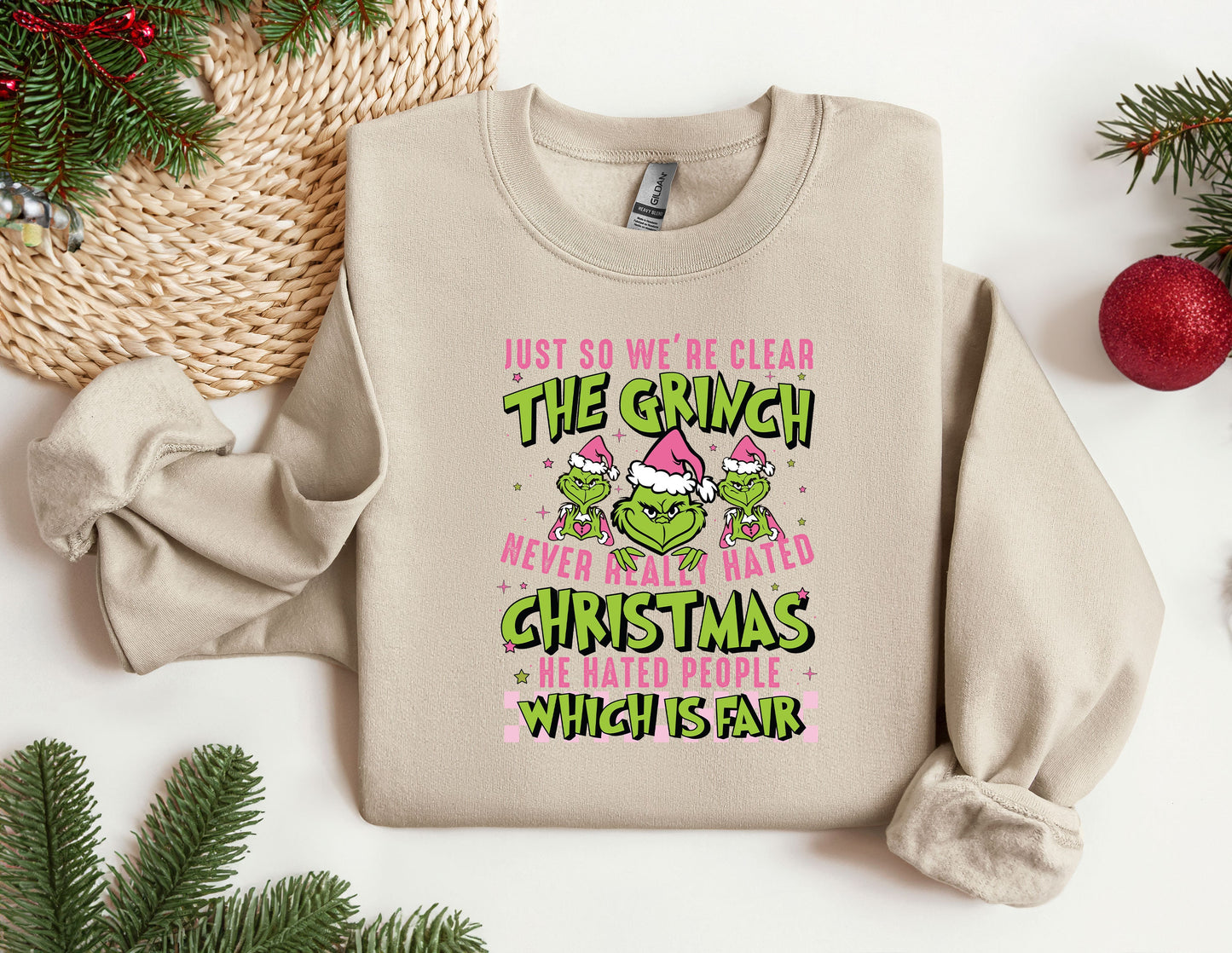 a sweater that says, just so we're wearing the grin when we '