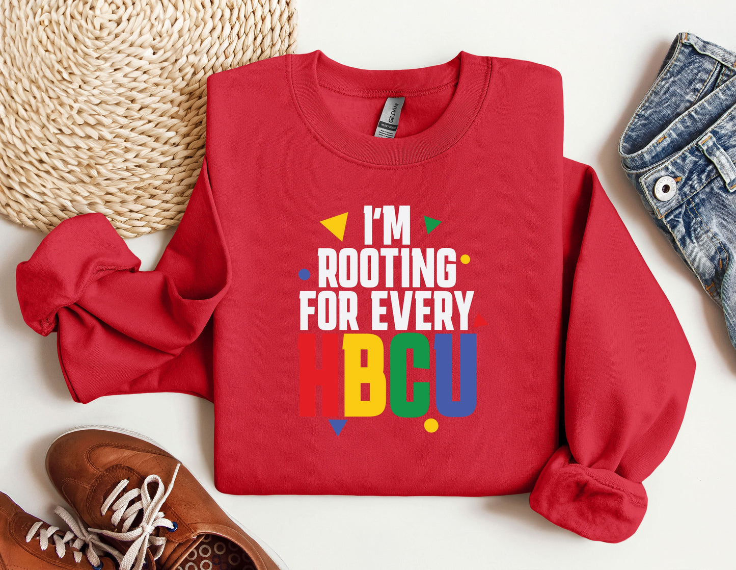 a red shirt that says i'm rooting for every abcu