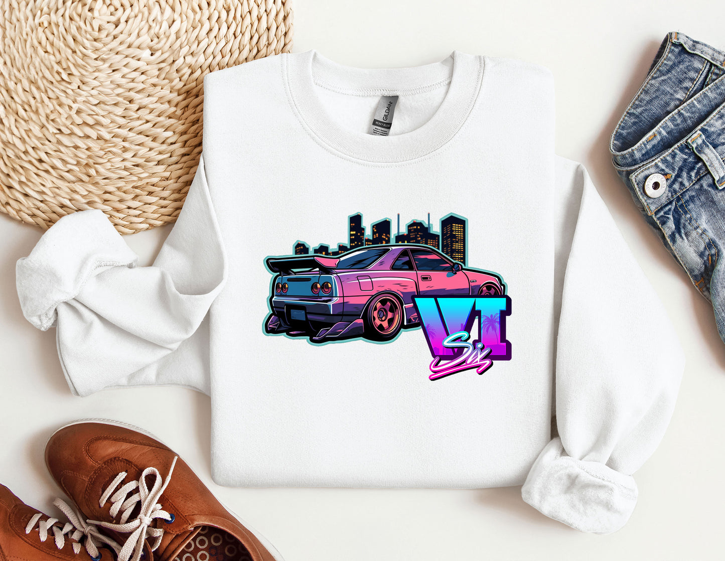 a white shirt with a pink car on it