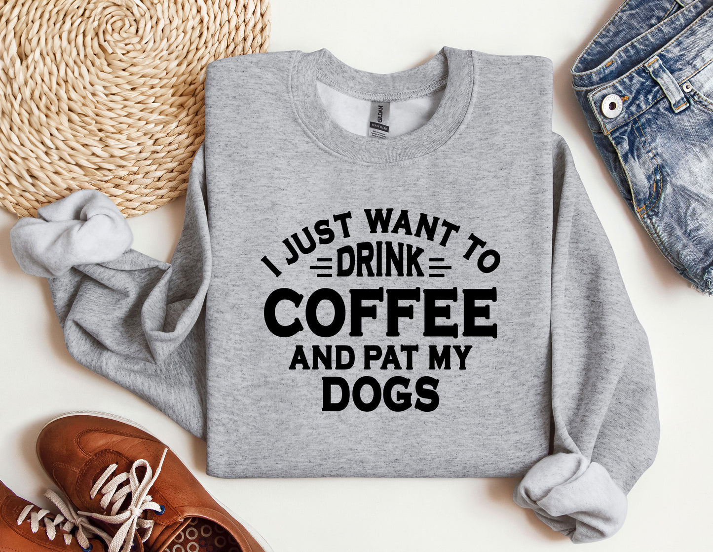 a sweatshirt that says i just want to drink coffee and pat my dogs