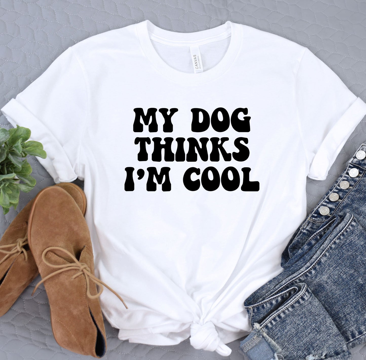 a t - shirt that says, my dog thinks i'm cool