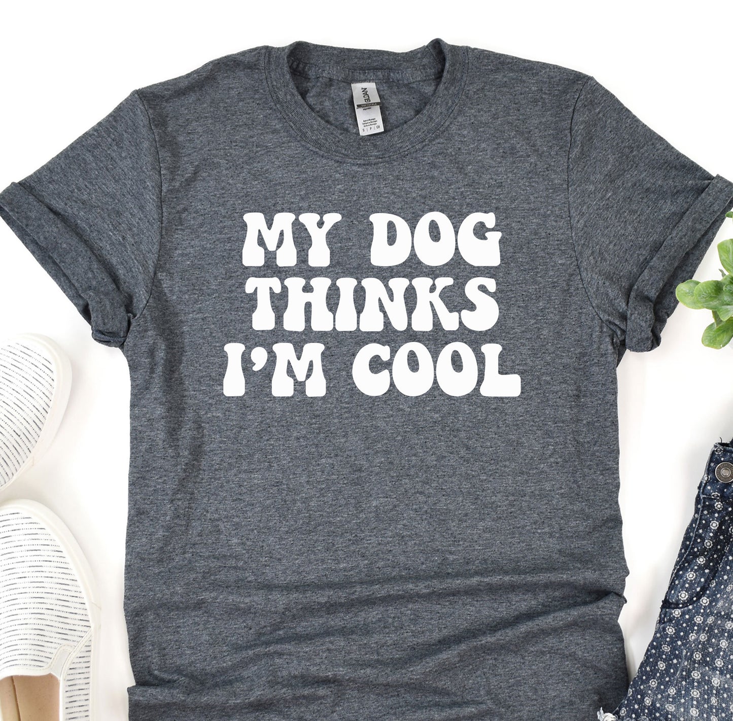 a t - shirt that says, my dog thinks i'm cool