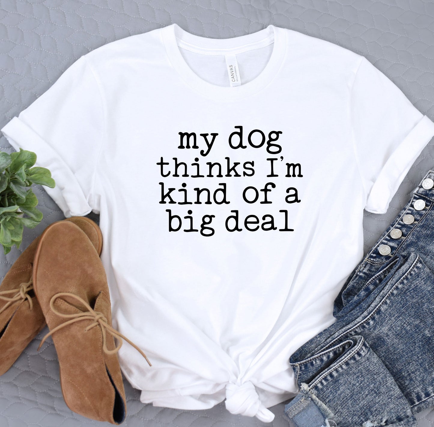 a t - shirt that says, my dog thinks i'm kind of a