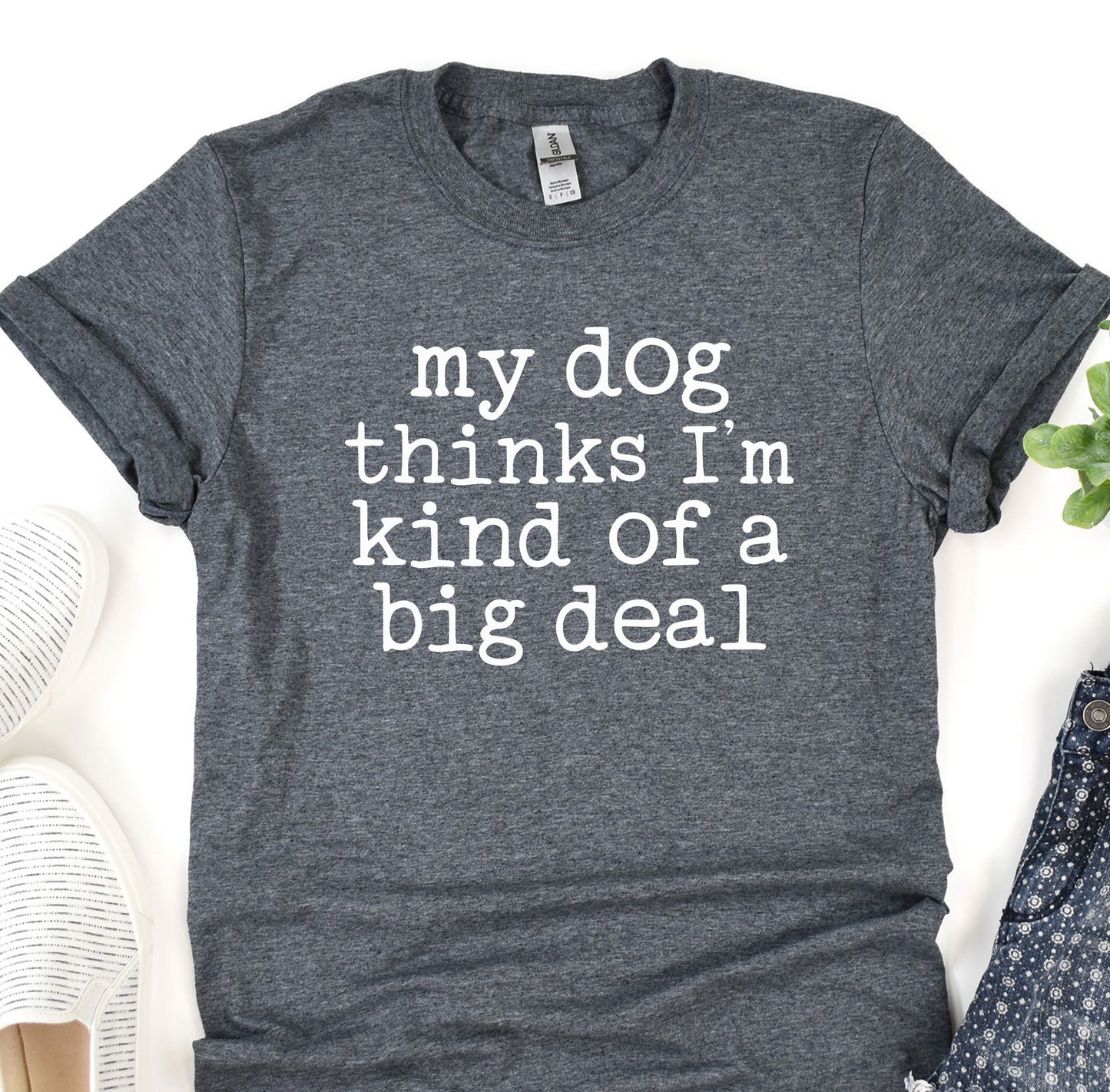 a t - shirt that says, my dog thinks i'm kind of a