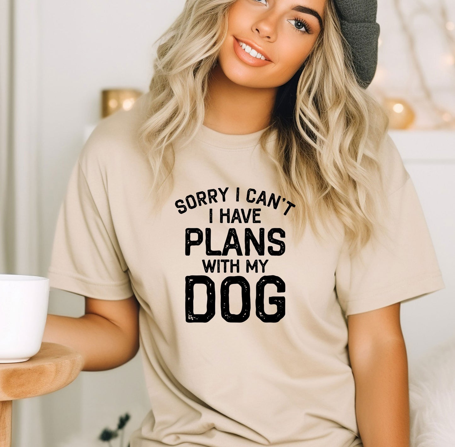 a woman wearing a t - shirt that says sorry i can't i have