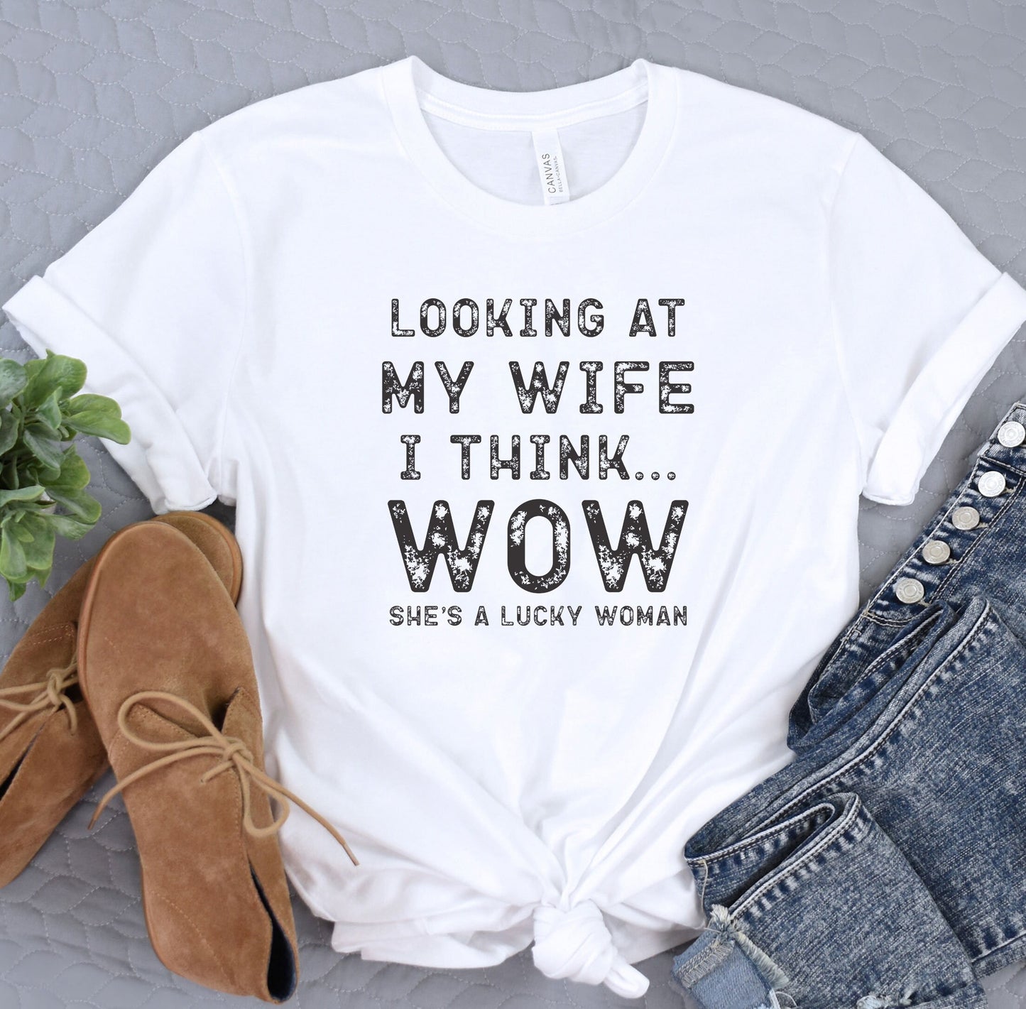 a t - shirt that says looking at my wife i think wow she's