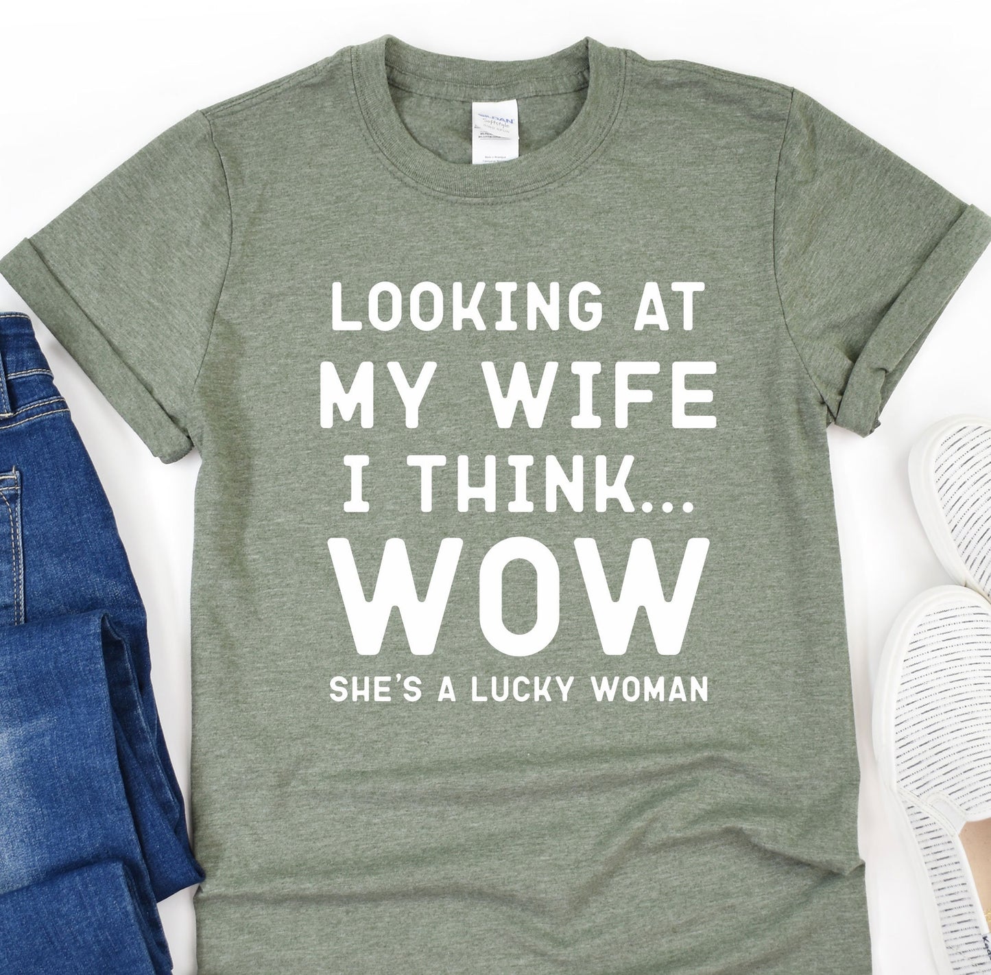 a t - shirt that says looking at my wife, i think she's
