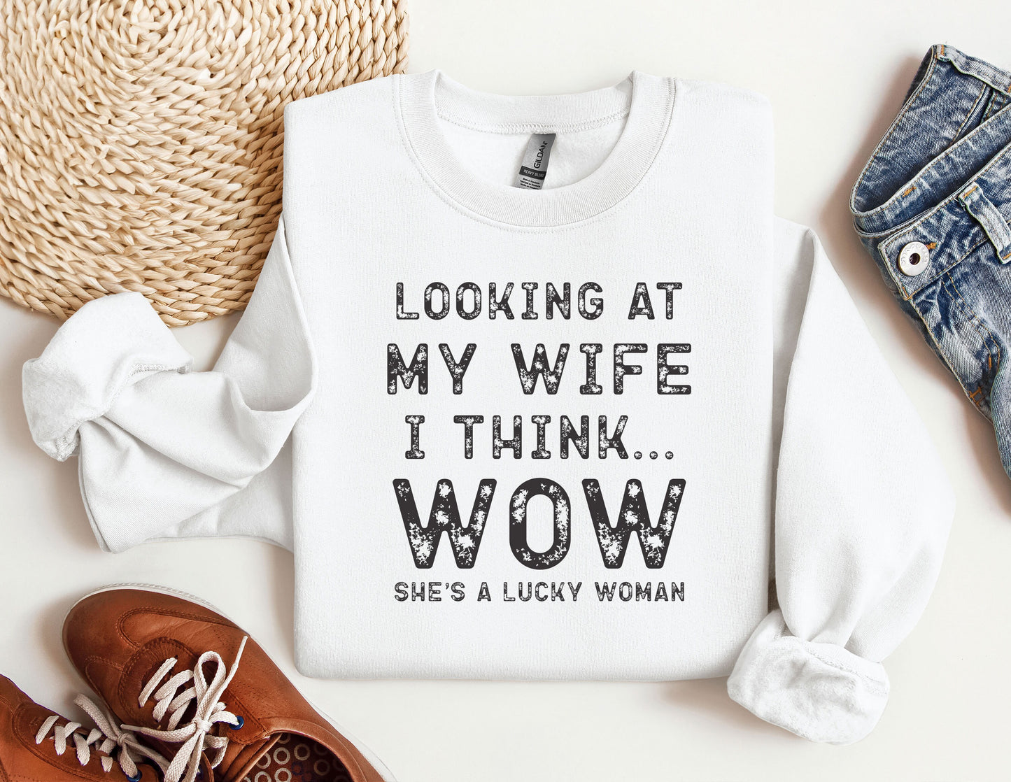 a sweater that says looking at my wife i think wow she's a lucky