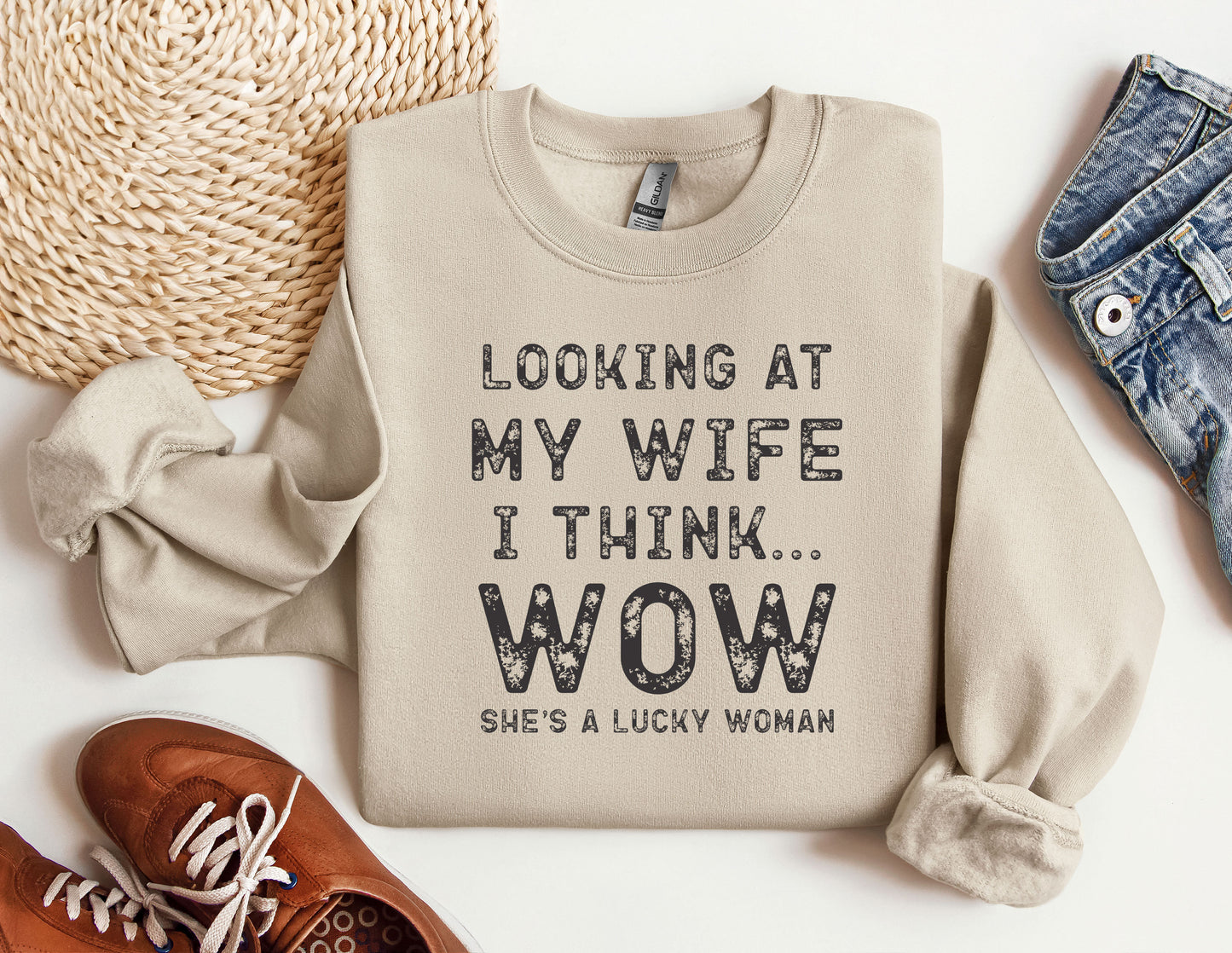 a sweater that says looking at my wife i think wow she's a lucky