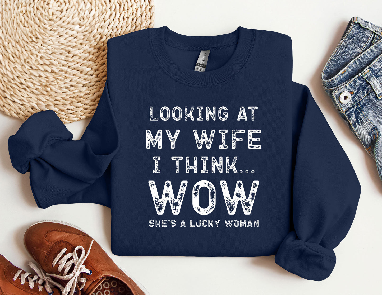 a sweatshirt that says looking at my wife i think she's a lucky woman