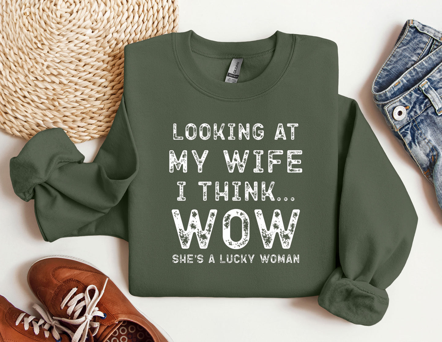 a sweatshirt that says looking at my wife i think she's a lucky woman
