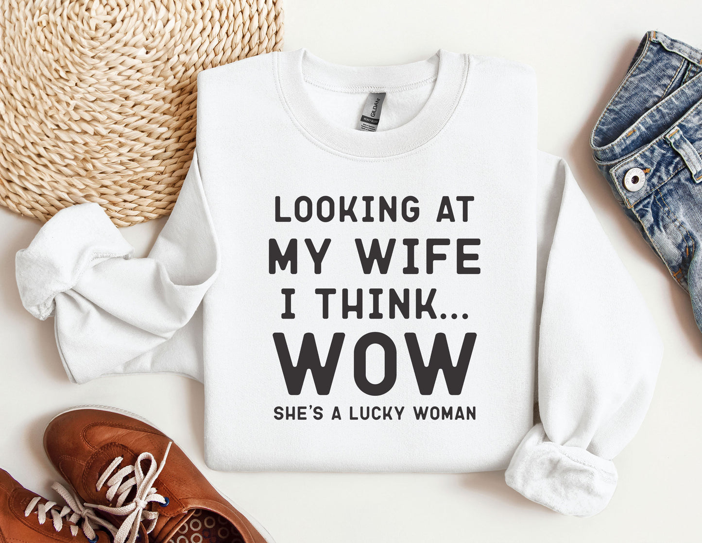 a sweater that says looking at my wife i think wow she's a lucky