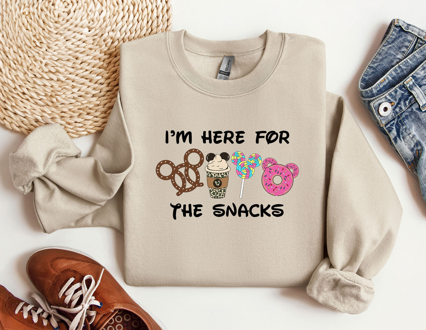 a sweater that says i'm here for the snacks