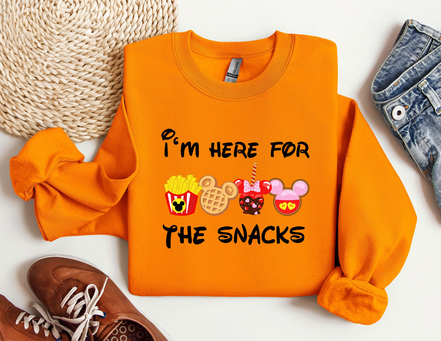 a pair of sneakers and a sweatshirt with the words i'm here for the