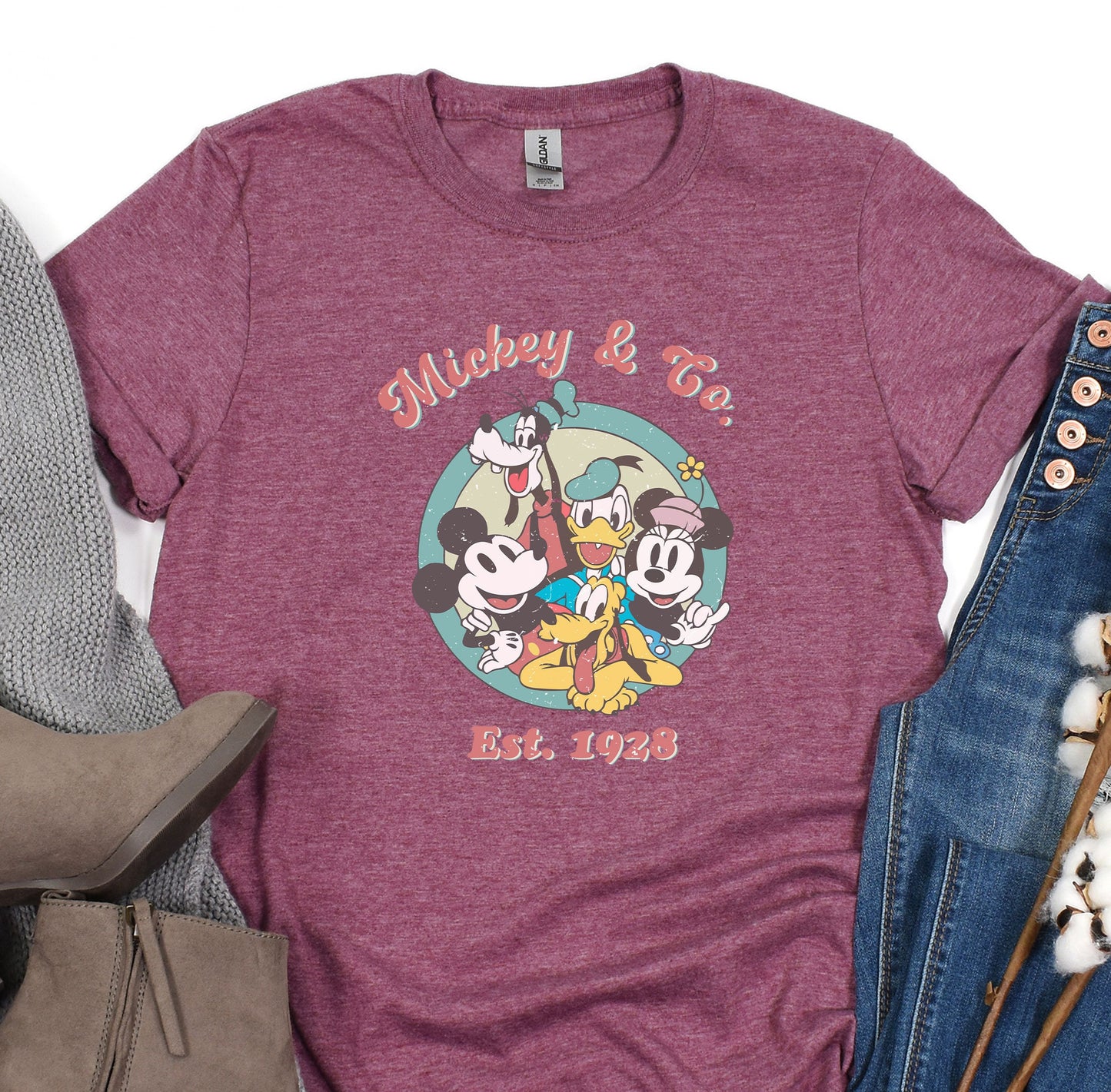 a t - shirt with mickey and friends on it