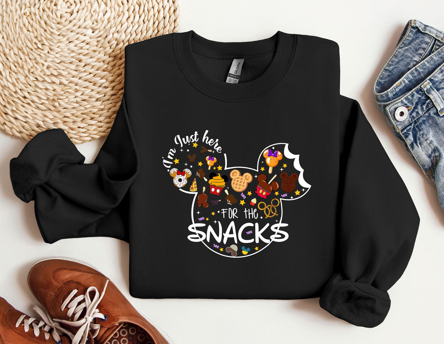 a mickey mouse shirt with the words i'm not too into the snacks on