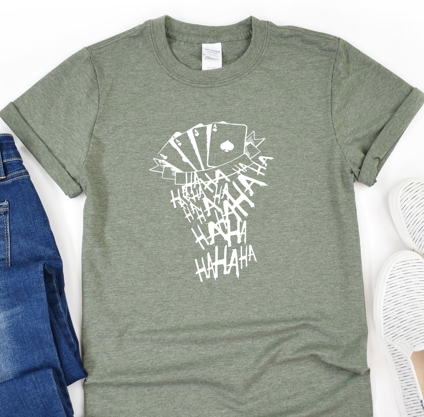 a t - shirt that has a picture of a hand of cards on it