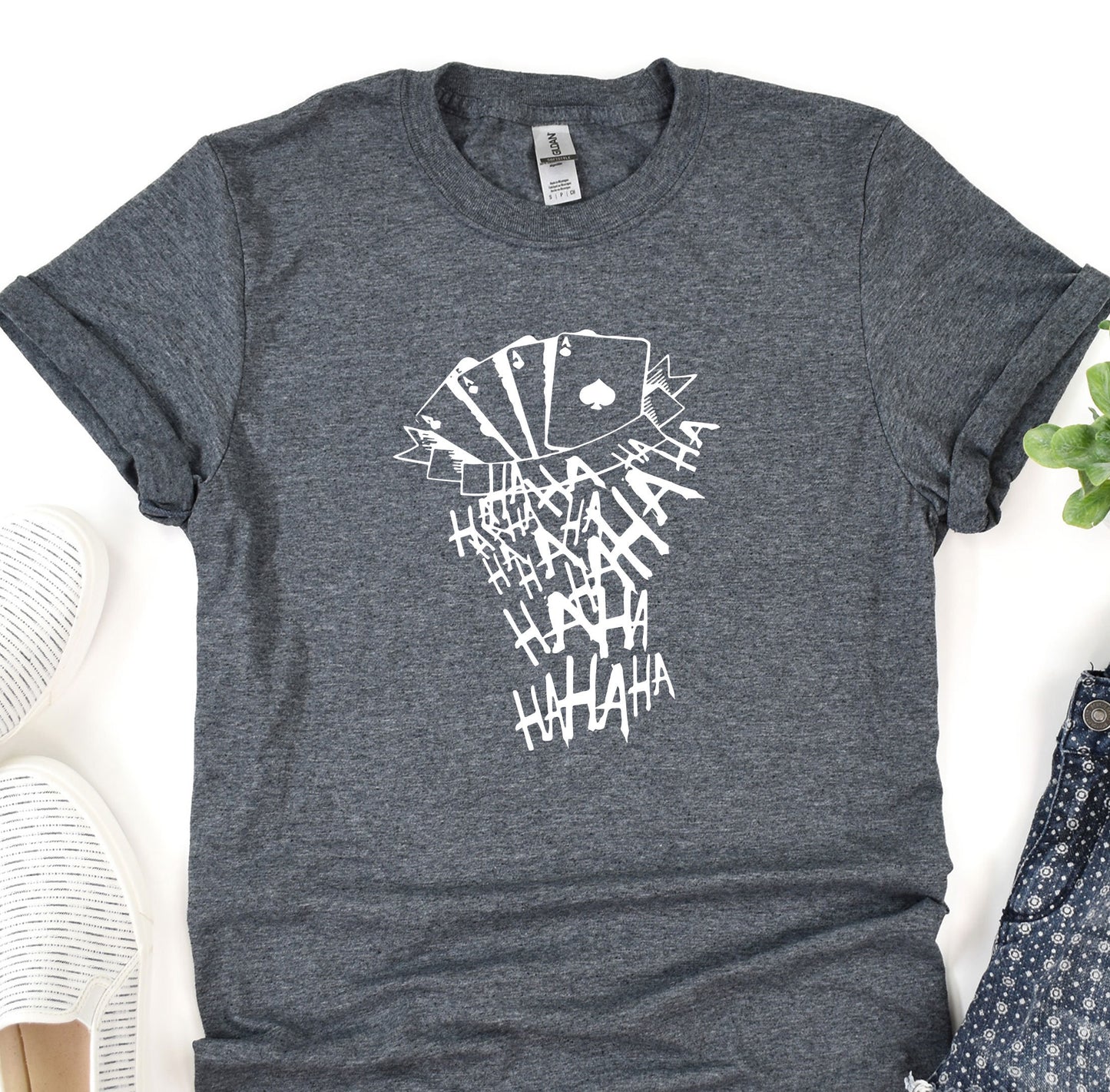 a t - shirt that has a picture of a person's face on it