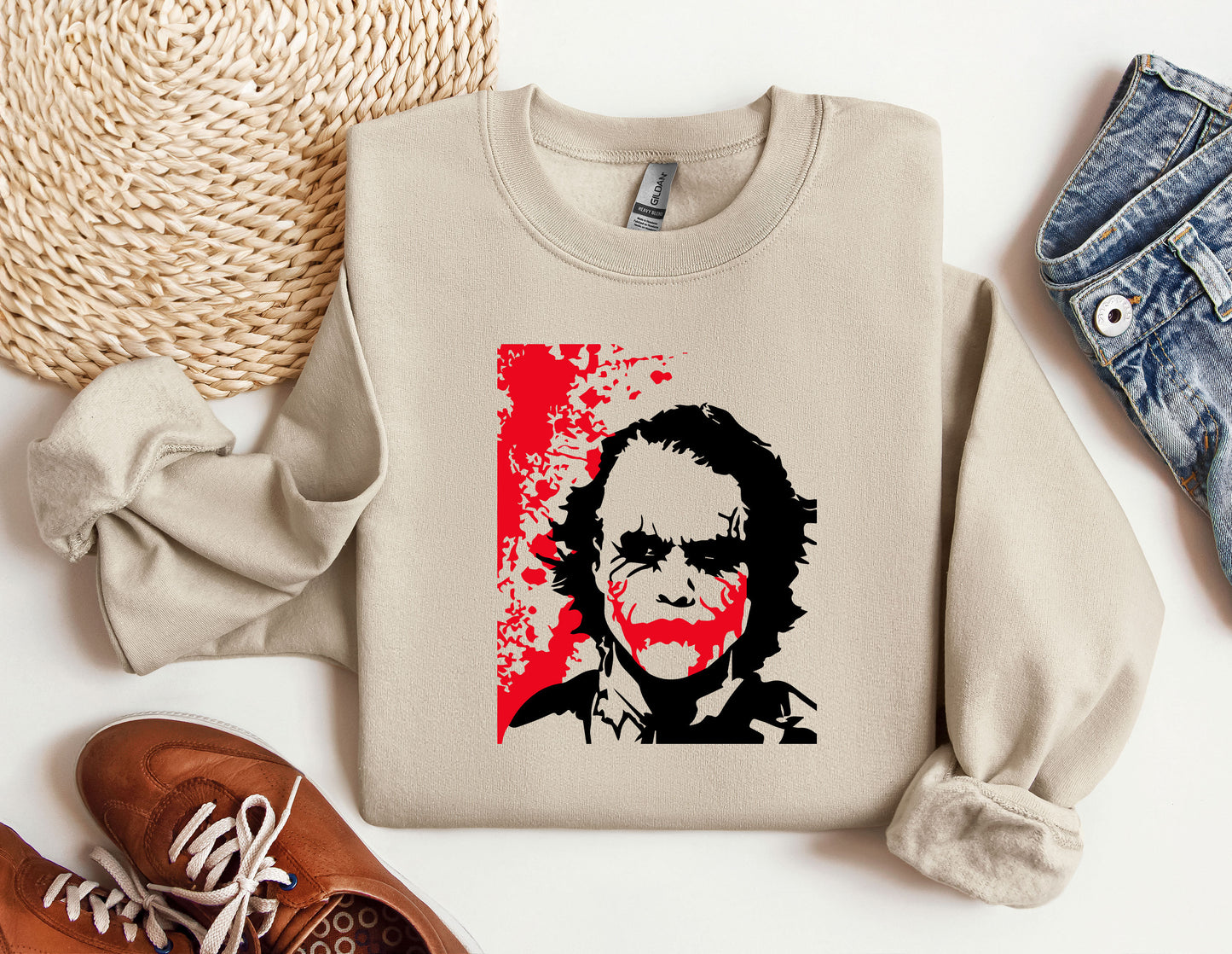 a sweater with a picture of a man's face on it