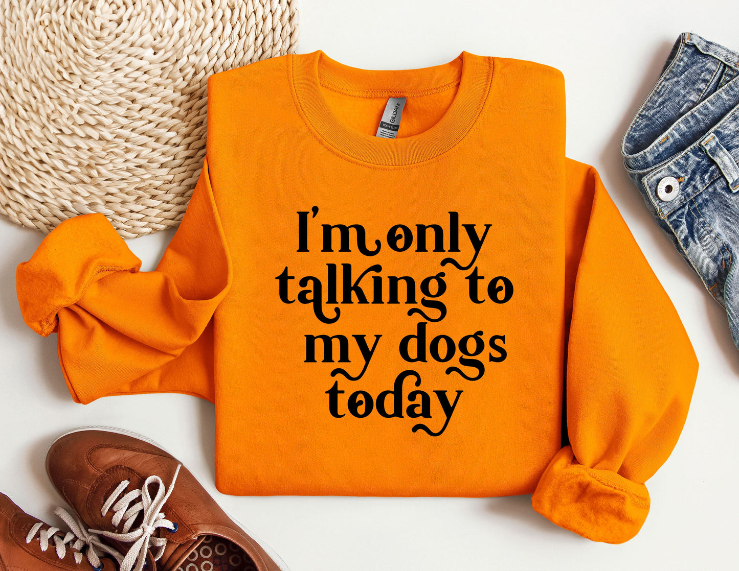an orange shirt that says i'm only talking to my dogs today