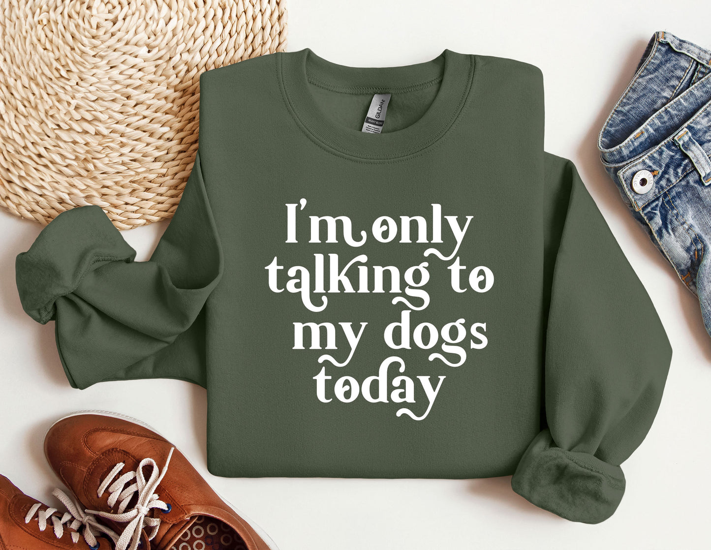 a green sweatshirt that says i'm only talking to my dogs today