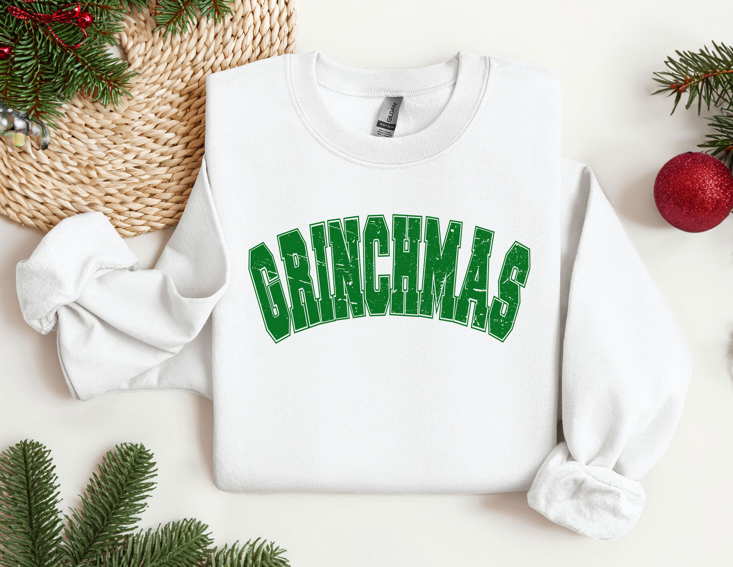 a white sweatshirt with the word grinna's on it