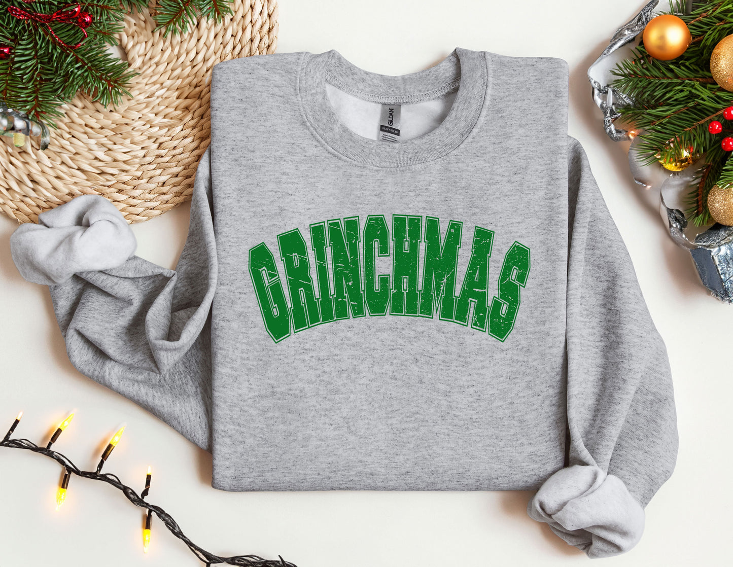 a grey sweatshirt with the word grinna's on it
