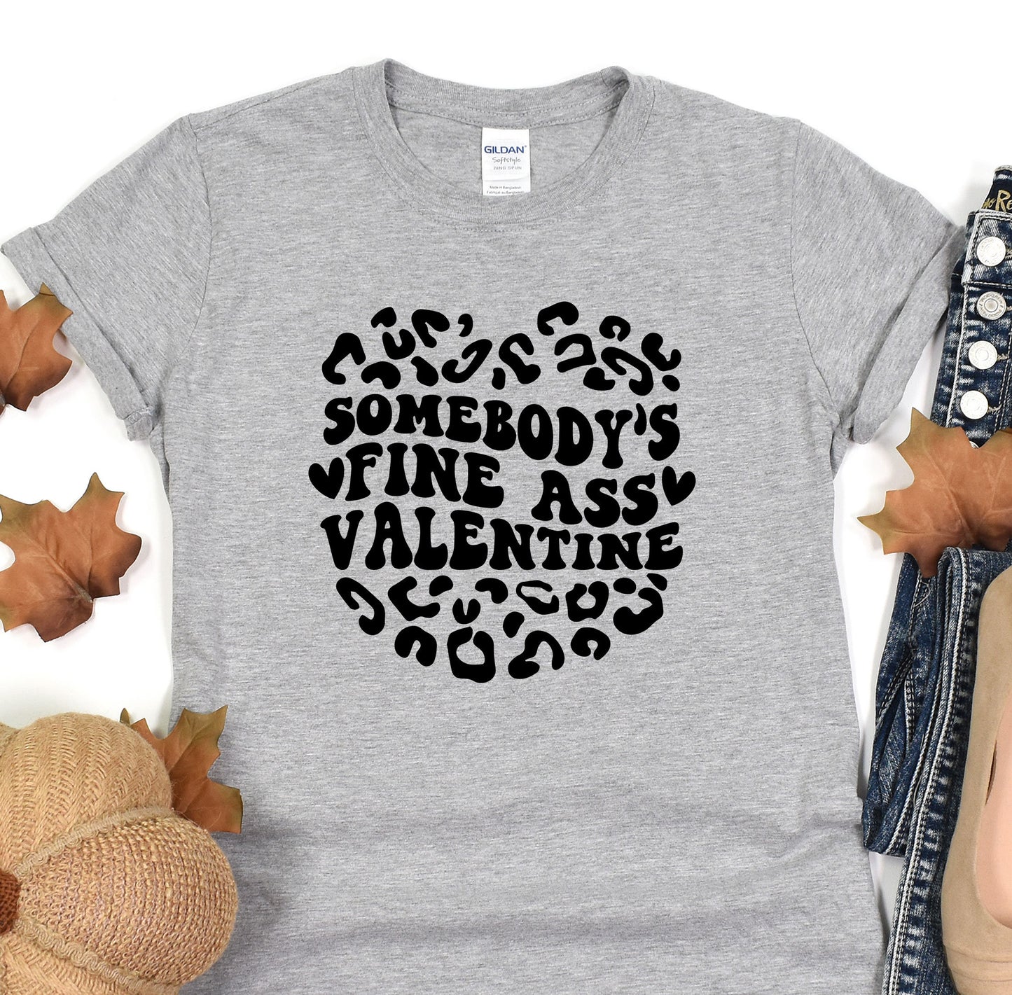 a t - shirt that says somebody's wine ass valentine