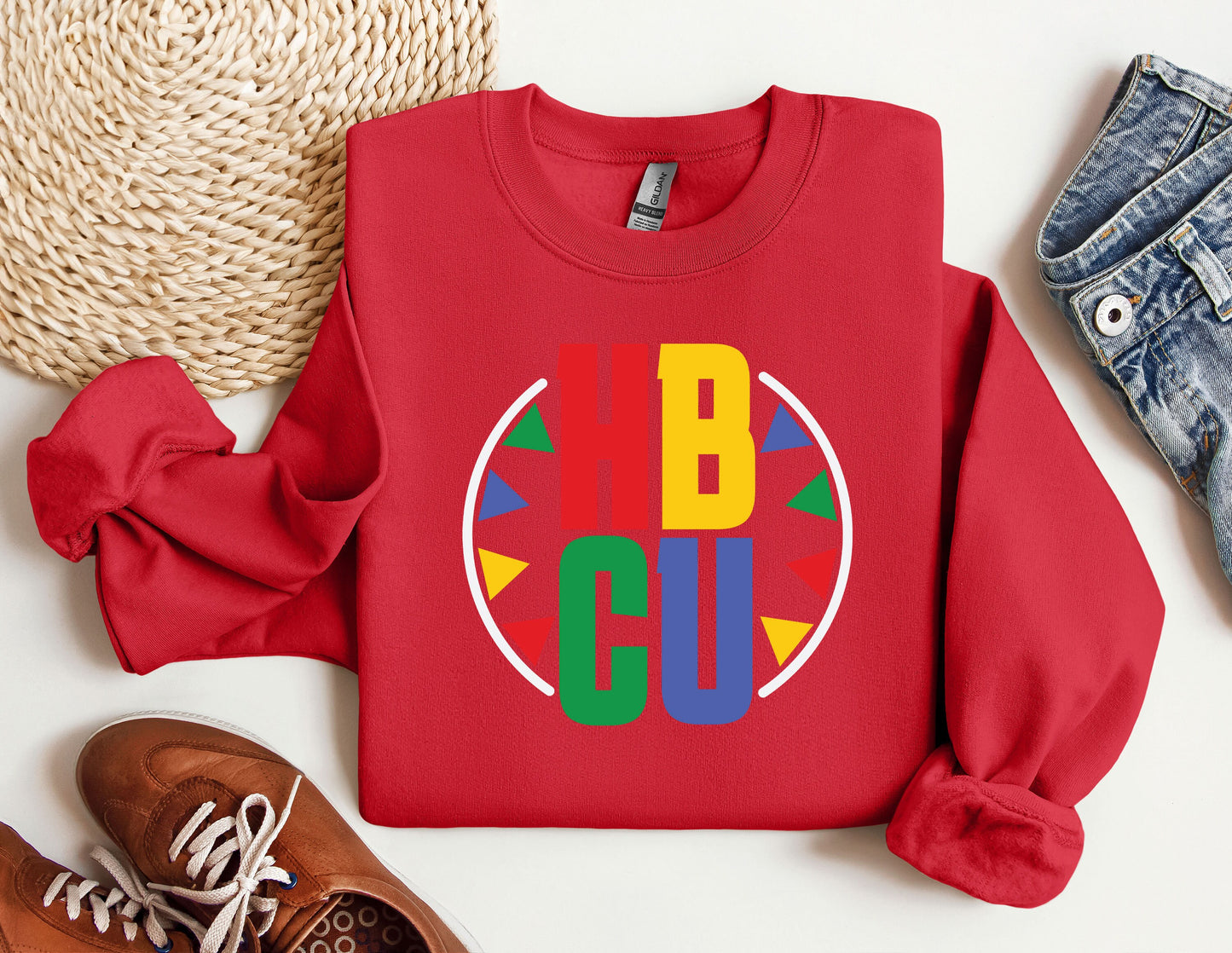 a red shirt with a colorful logo on it