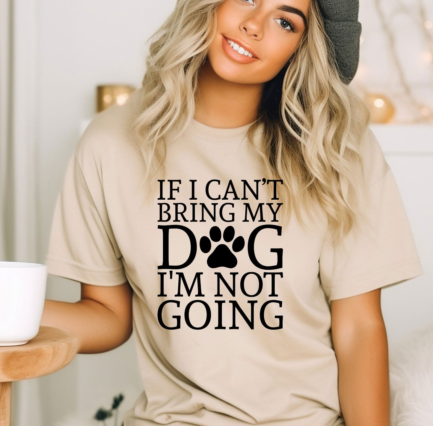 a woman wearing a t - shirt that says i can't bring my dog