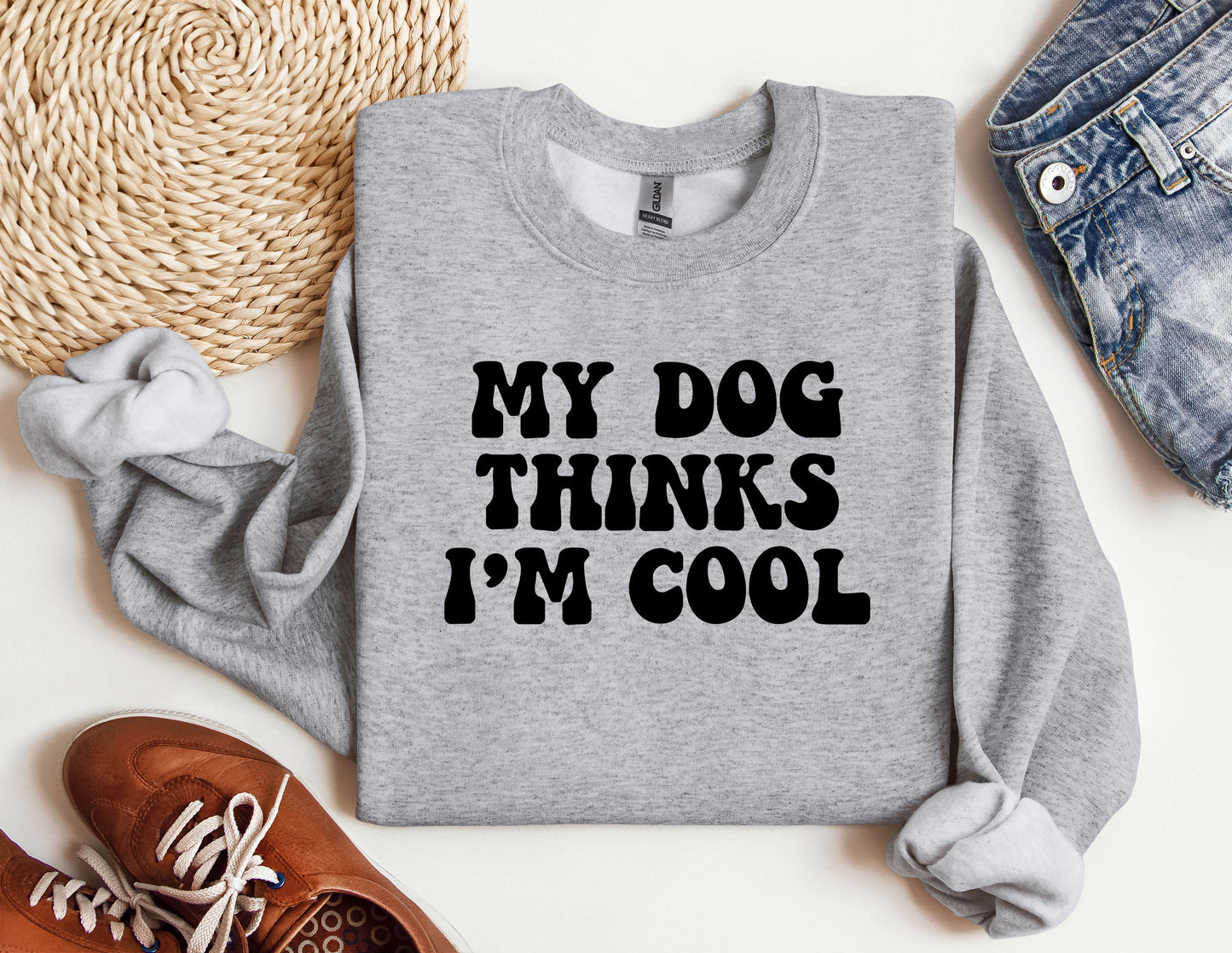 a sweater that says, my dog thinks i'm cool