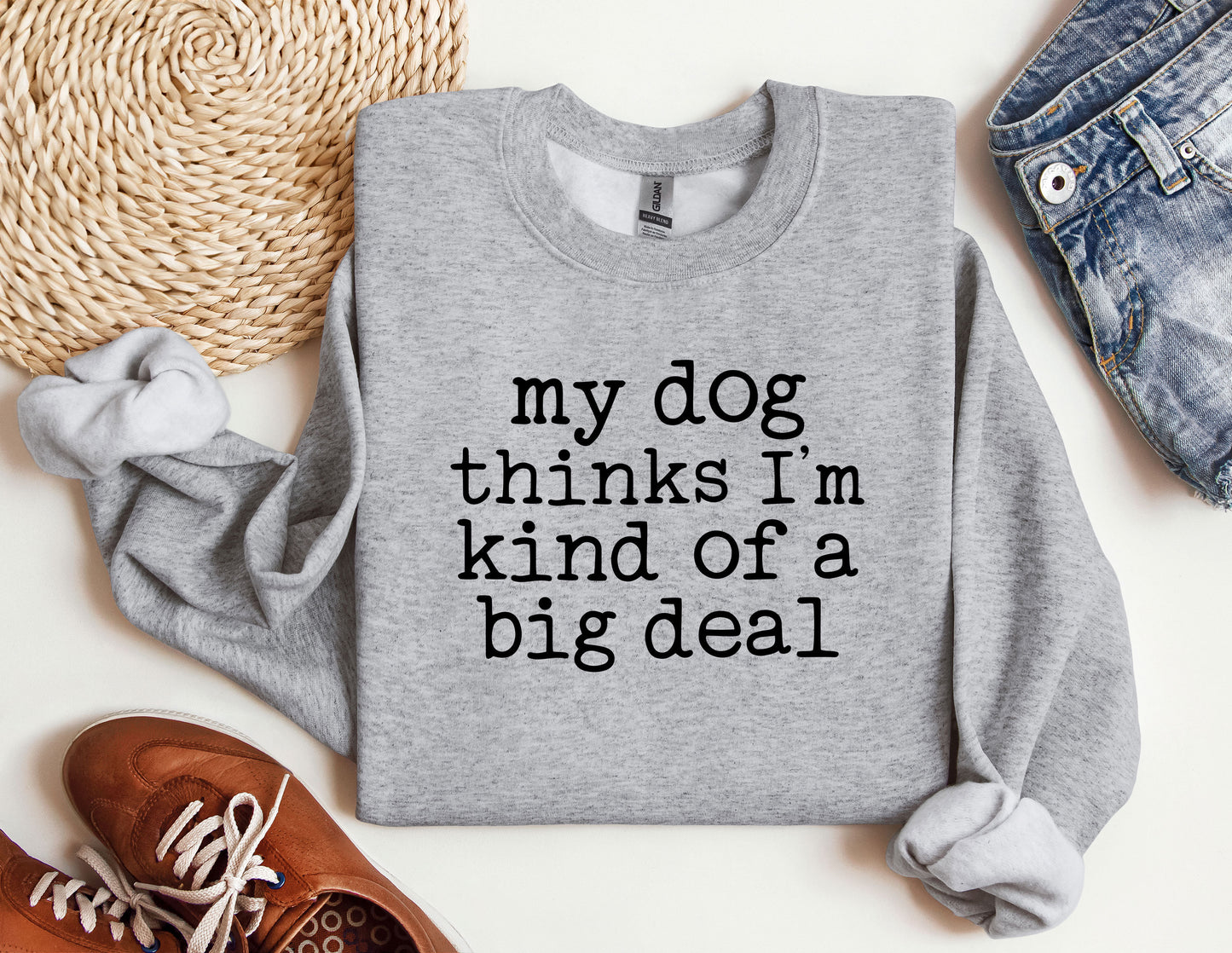 a sweater that says, my dog thinks i'm kind of a big deal