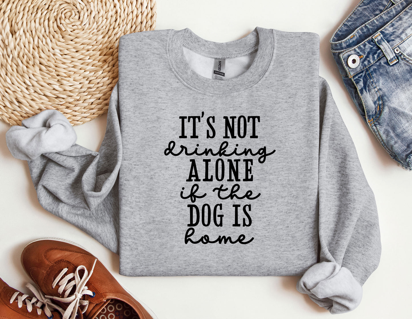 a sweater that says it's not drinking alone if the dog is home