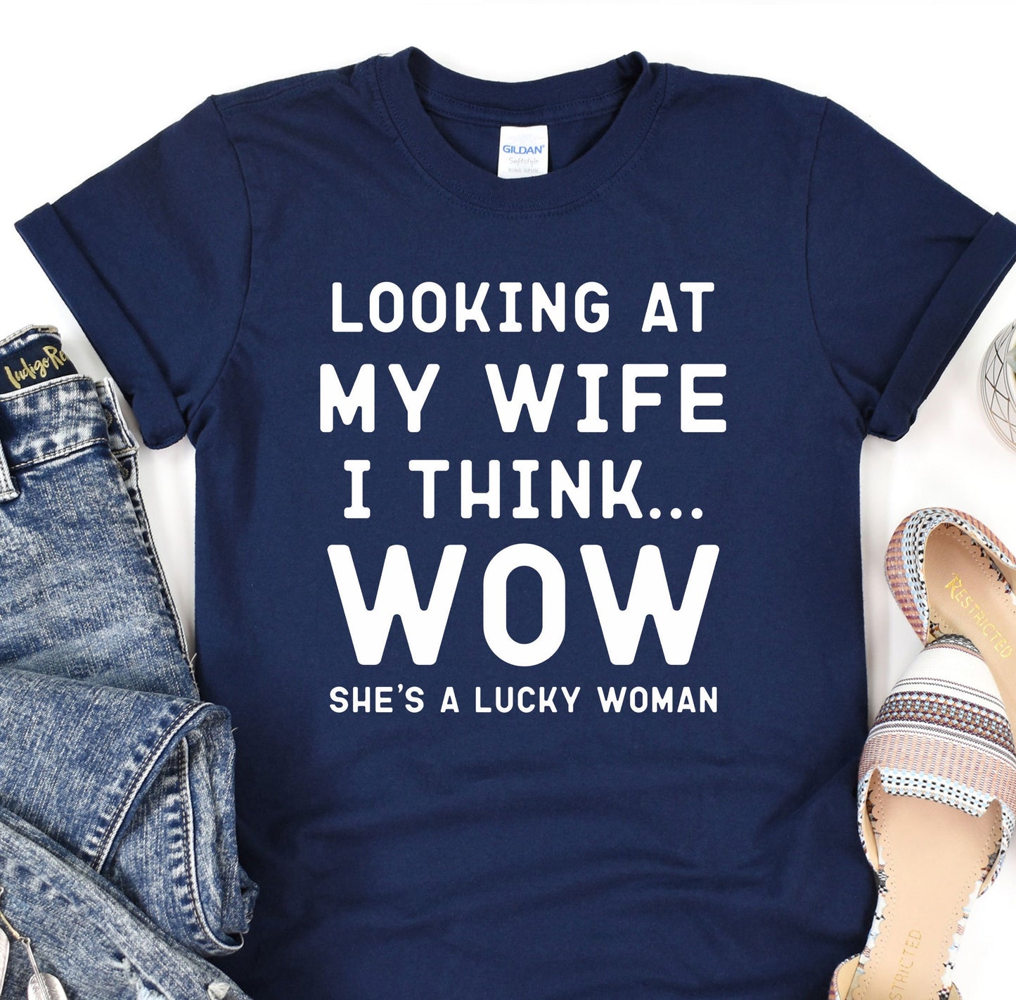 a t - shirt that says looking at my wife i think she's a