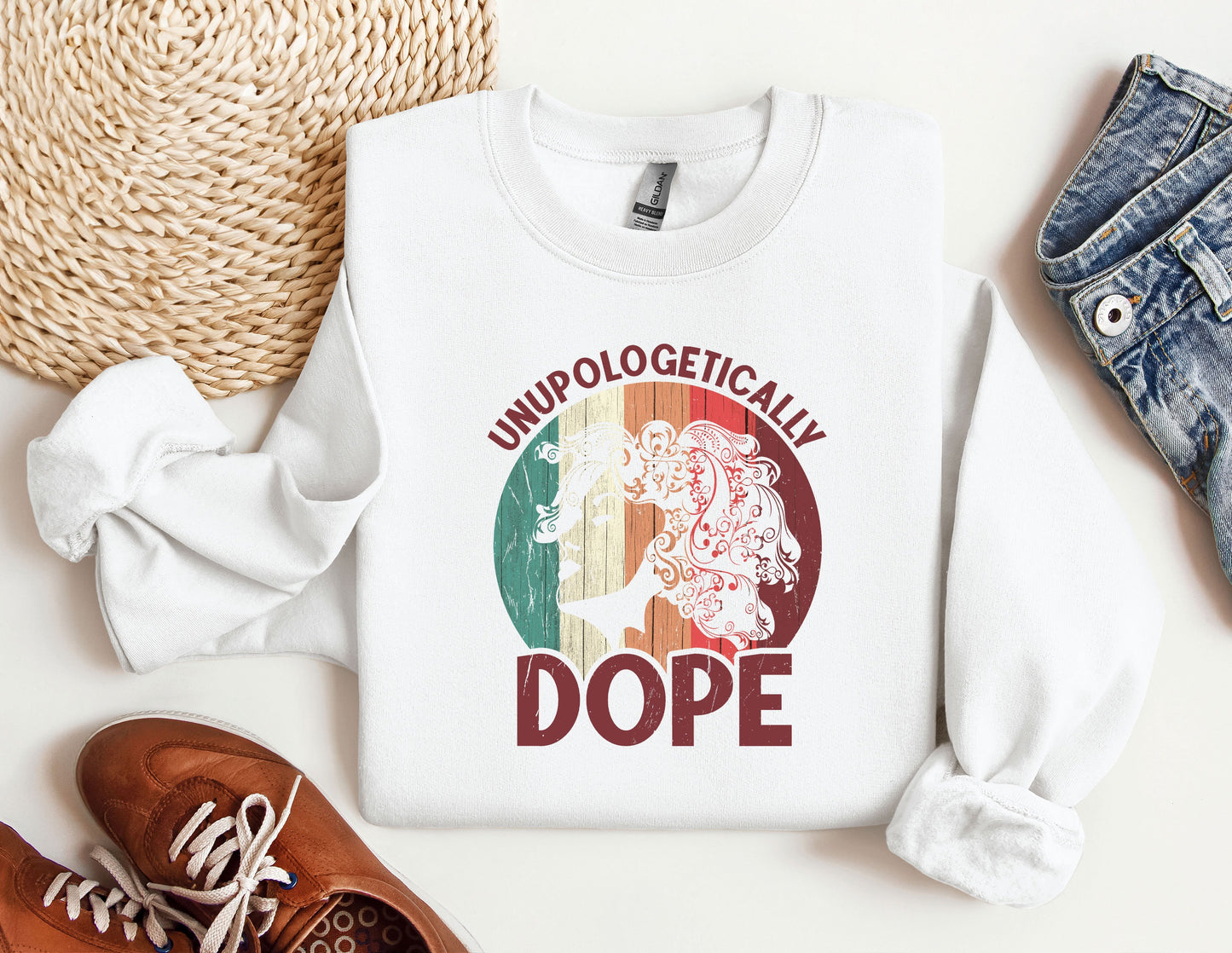 a white sweatshirt with a picture of a woman's face on it
