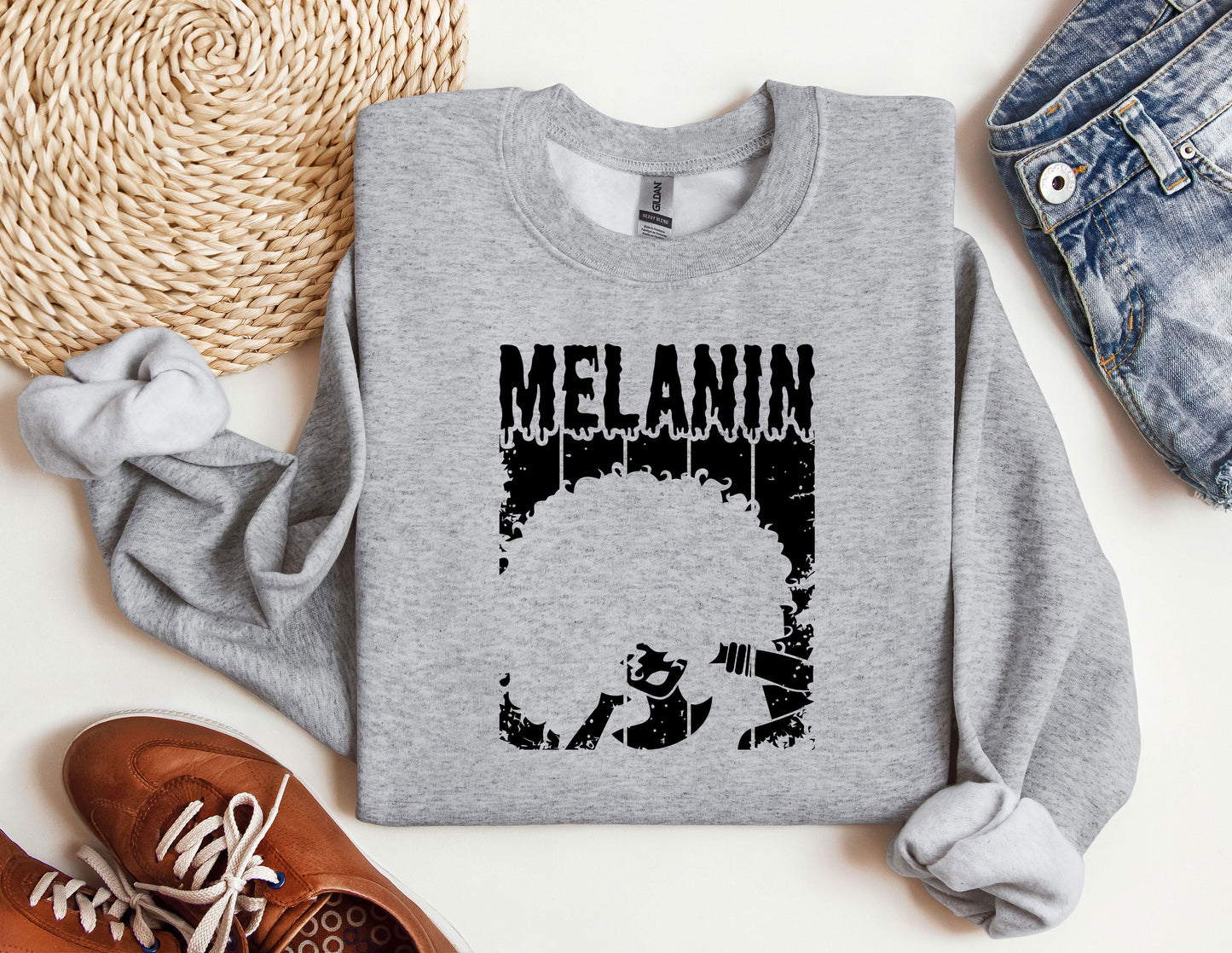 a sweatshirt with a picture of a man's face on it