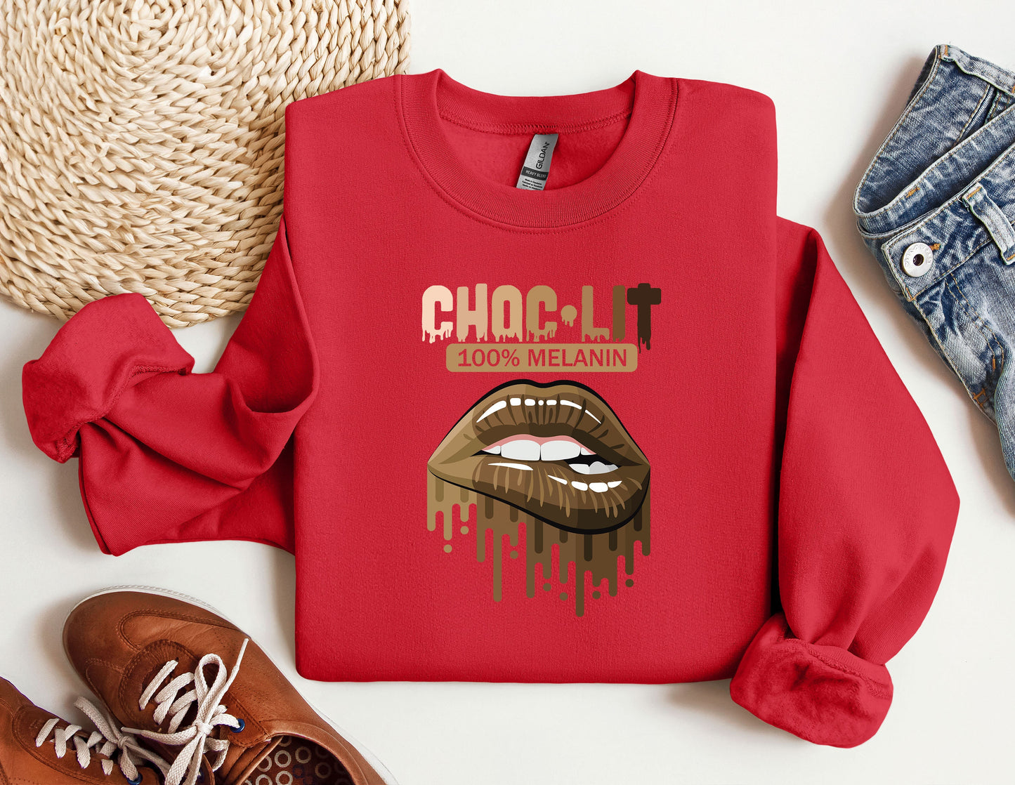 a red shirt with a picture of a woman's mouth on it