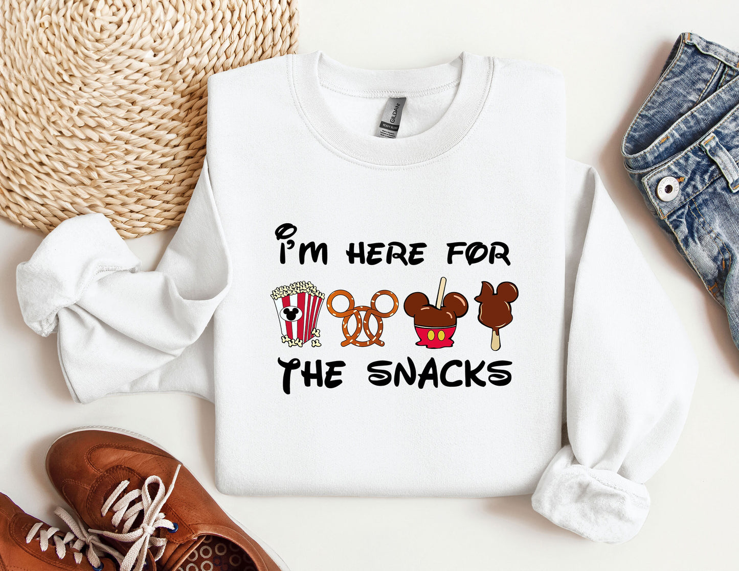 a white shirt that says i'm here for the snacks
