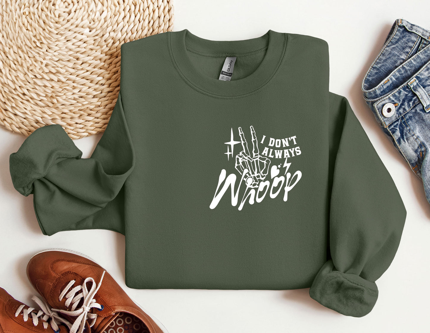 a green sweatshirt with the words don't stop and a pair of sneakers