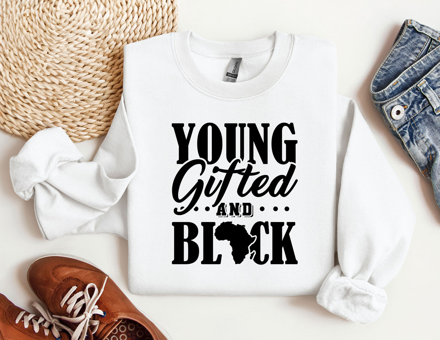 a white shirt with the words young, gifted and black on it