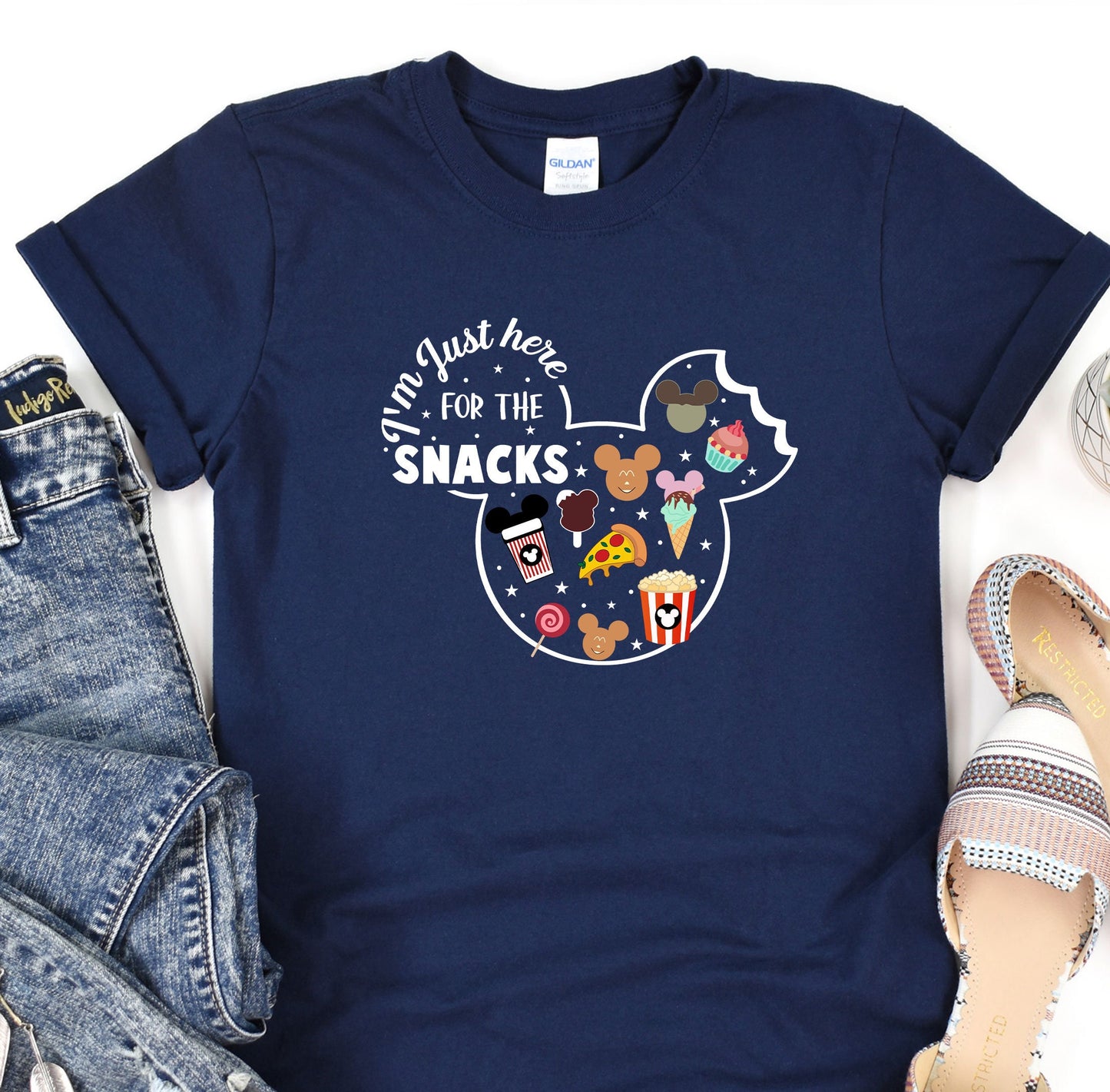 a mickey mouse shirt that says i'm just here for the snacks