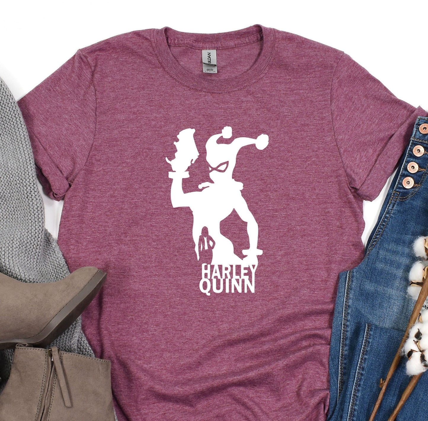 a women's t - shirt with a graphic of a man and a woman