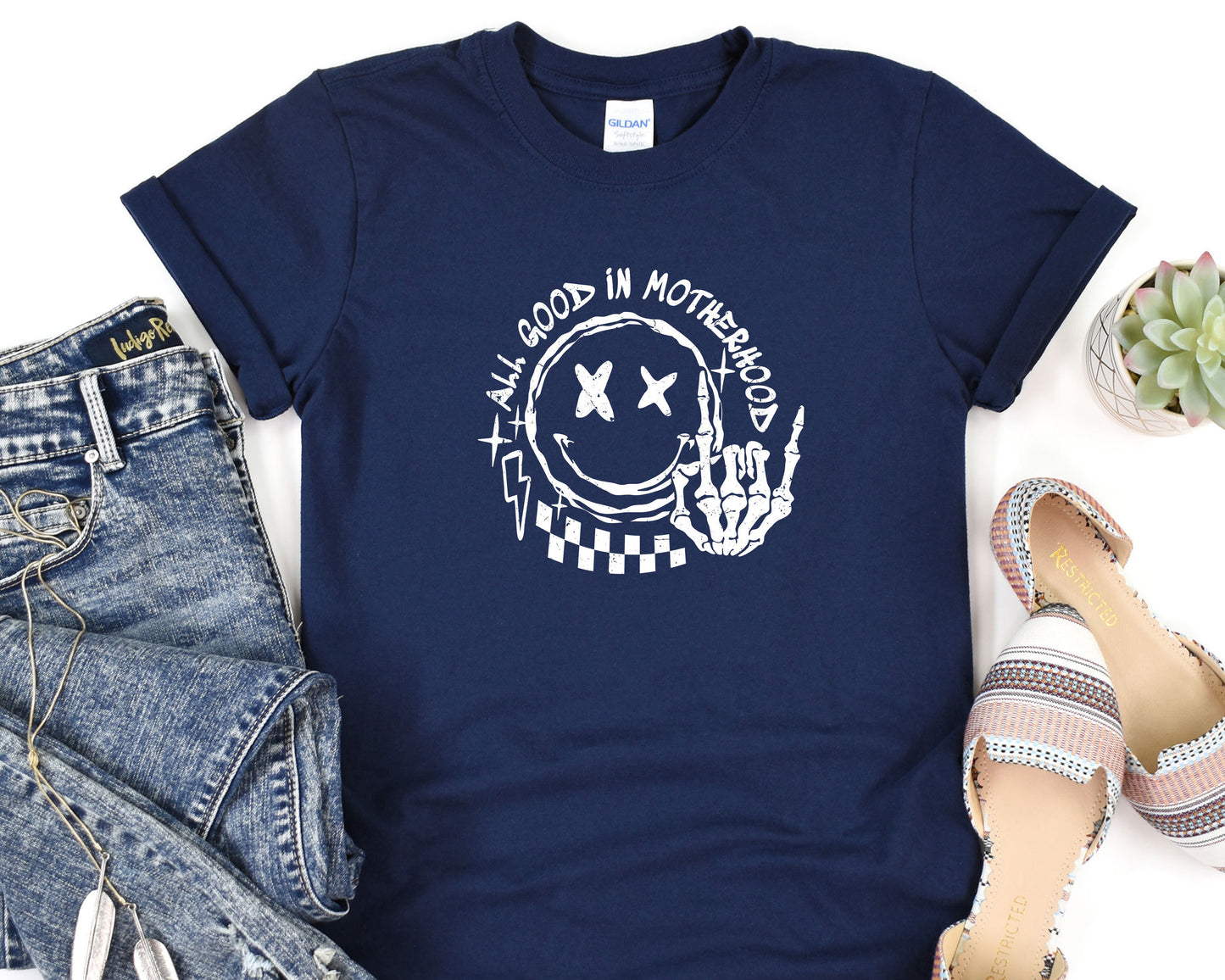 a t - shirt with a picture of a person's hand on it