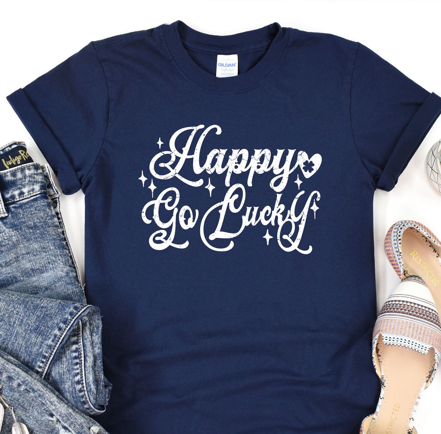 a t - shirt that says happy go lucky on it